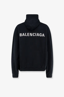 Balenciaga mens black cotton hoodie with bold white lettering across the back for casual wear