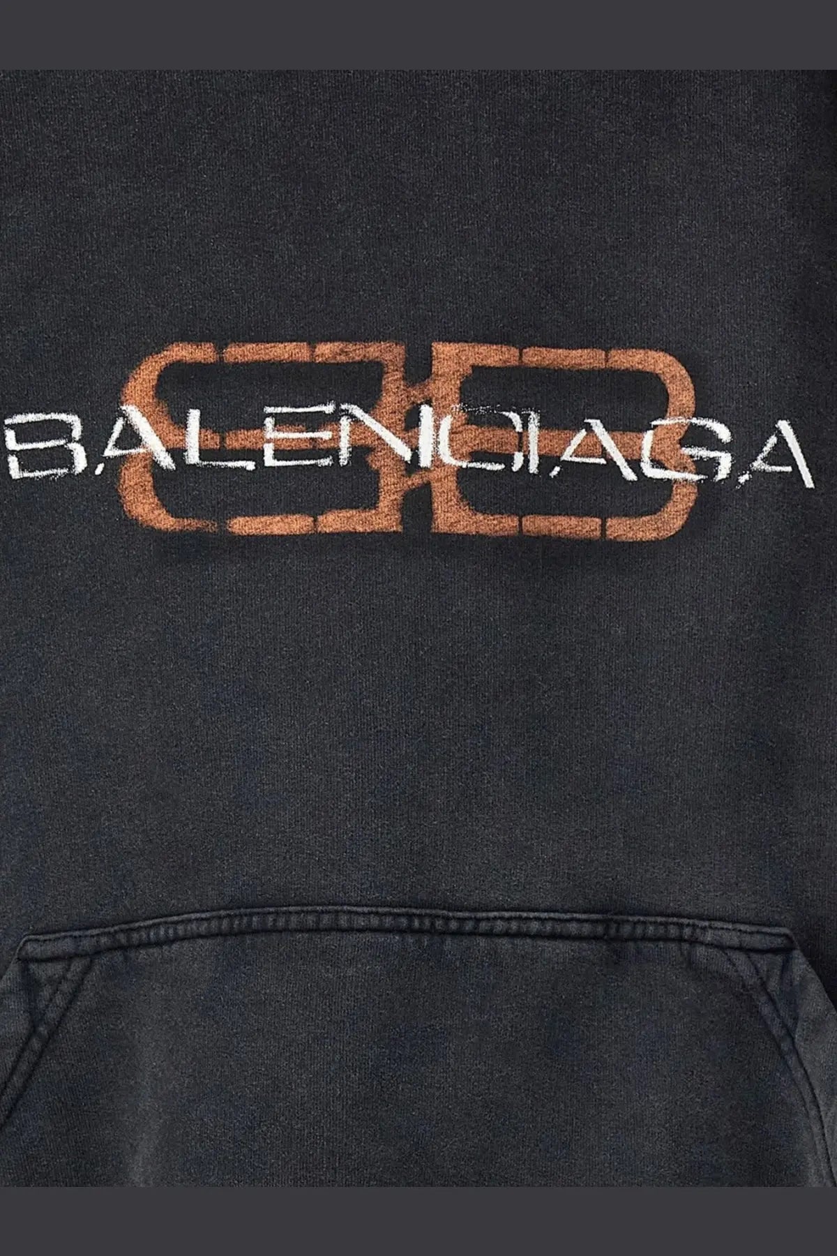 Balenciaga men’s black cotton hooded sweatshirt with a distressed orange and white logo print on front