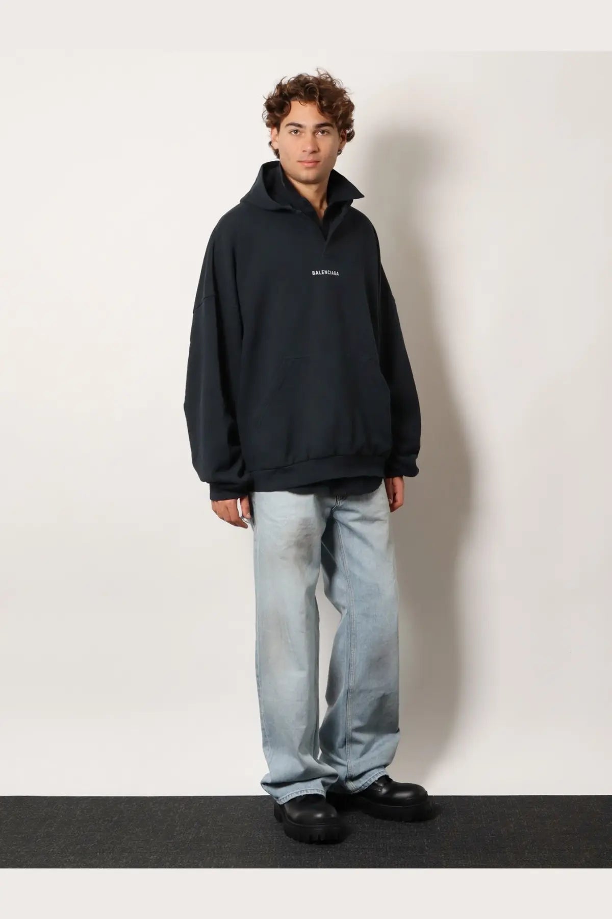 Balenciaga men’s black cotton hooded sweatshirt with minimalist white logo on the chest