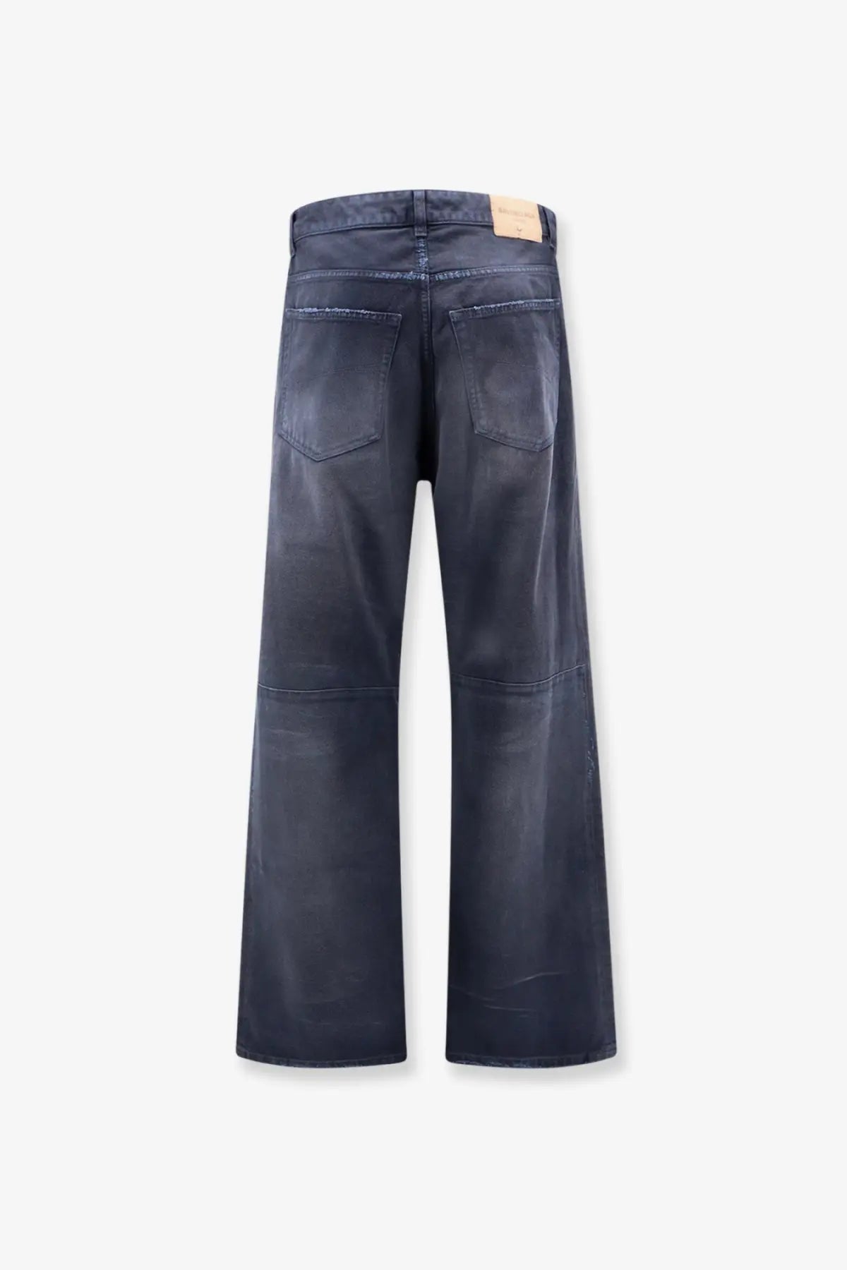 Balenciaga men’s cotton jeans in dark indigo blue with wide-leg cut and subtle distressing on back pockets