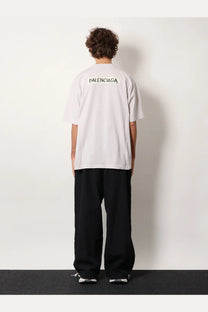 Balenciaga men’s white cotton t-shirt showing the back with black lettering across the back