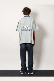 Light gray balenciaga men’s football jersey shirt with bold white logo and black lettering on the back side