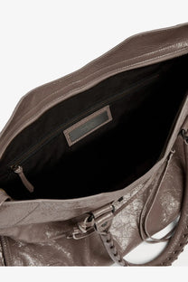 Balenciaga men’s le city handbag in muted gray textured leather with crinkled surface and braided strap details