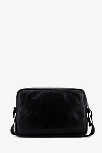 Balenciaga men’s black leather crossbody bag with textured finish and adjustable strap for everyday use