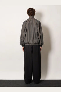 Balenciaga men’s madras nylon jacket grey featuring a sleek dark gray bomber style with matte finish and elasticated cuffs