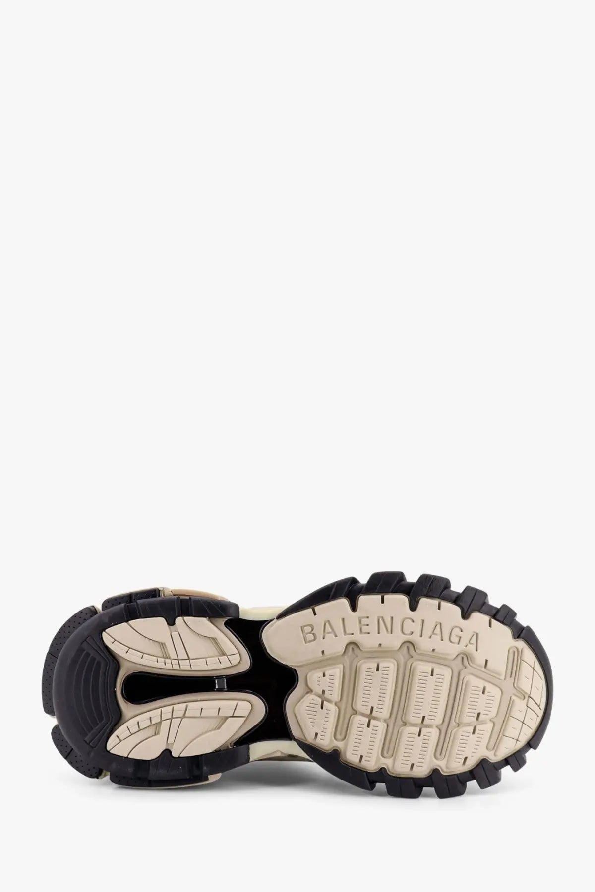 Balenciaga men’s mesh and rubber track sneakers beige showing black and beige chunky sole with embossed logo
