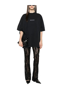 Black oversized balenciaga men’s t-shirt with minimalist white logo across the chest for casual wear