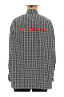 Balenciaga mens oversize fit shirt black with black and white checkered pattern and bold red lettering on the back