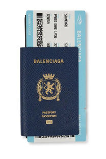 Balenciaga men’s passport wallet in navy blue textured leather with gold embossed logo and text