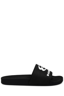 Balenciaga men’s black rubber slide sandal with white logo and stylized b emblem on the strap