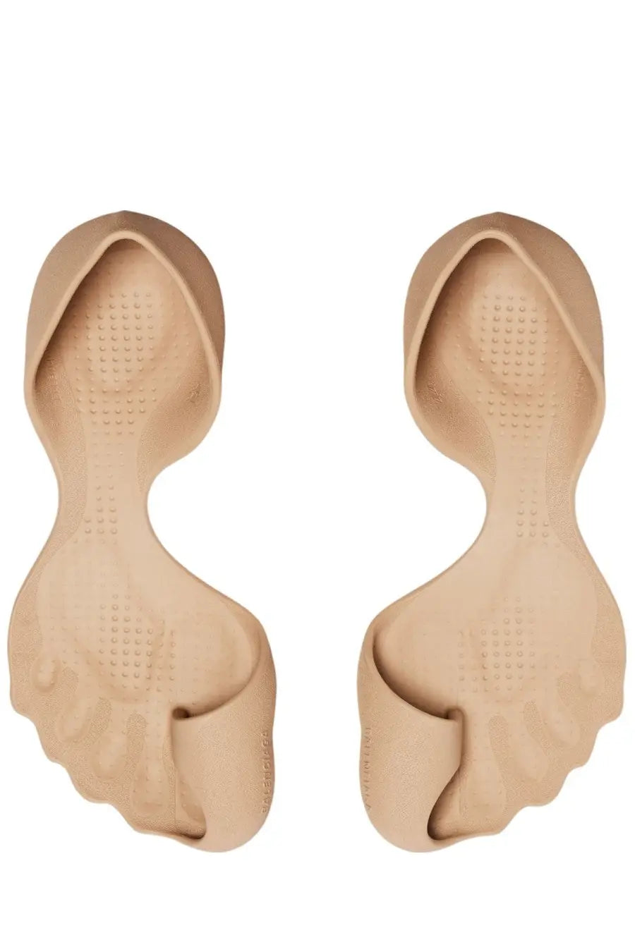 Beige silicone toe separators designed for comfort and foot alignment shown with balenciaga men’s sneaker zero beige