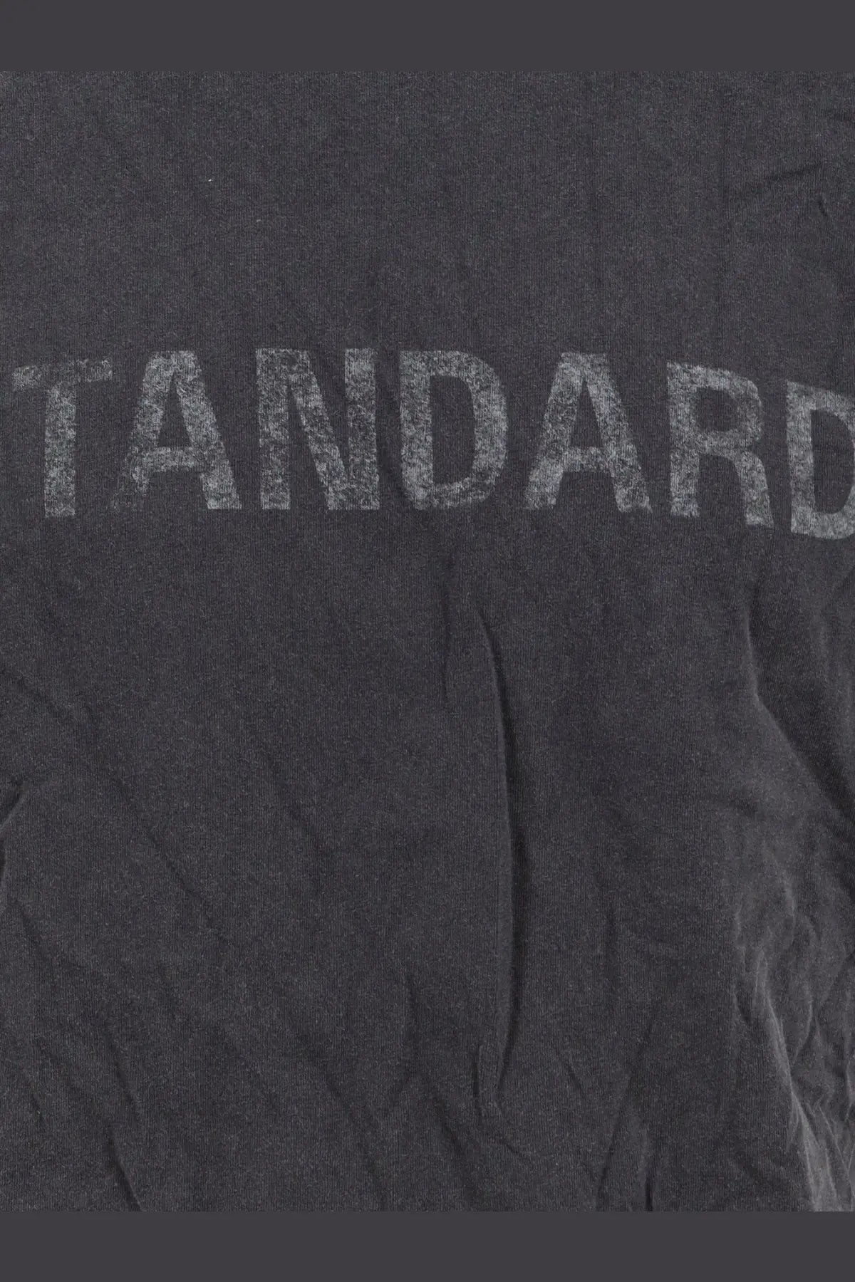Balenciaga men’s black cotton t shirt with dark gray heathered fabric and faded distressed standard lettering across chest