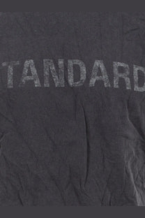 Balenciaga men’s black cotton t shirt with dark gray heathered fabric and faded distressed standard lettering across chest