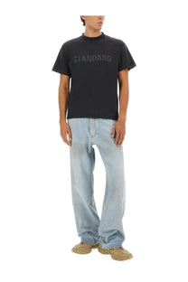 Balenciaga men’s black short-sleeved cotton t-shirt with standard printed in subtle faded gray across the chest