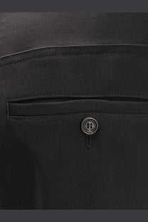 Black balenciaga button with matte finish and four-hole design on mens straight fit cotton trousers