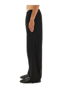 Balenciaga men’s stretch pants black wide-leg trousers with relaxed fit and elastic waistband front view