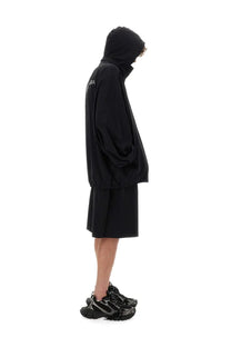 Balenciaga men’s black hoodie with relaxed oversized fit and subtle branding on the sleeve