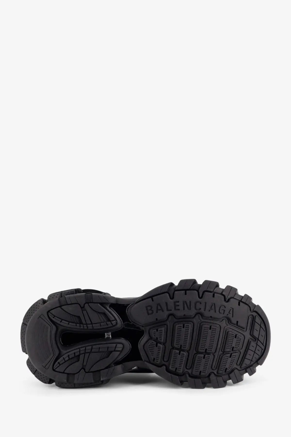 Black rubber sole with textured tread and embossed balenciaga logo on balenciaga men’s track nylon and mesh sneakers