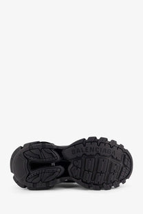 Black rubber sole with textured tread and embossed balenciaga logo on balenciaga men’s track nylon and mesh sneakers