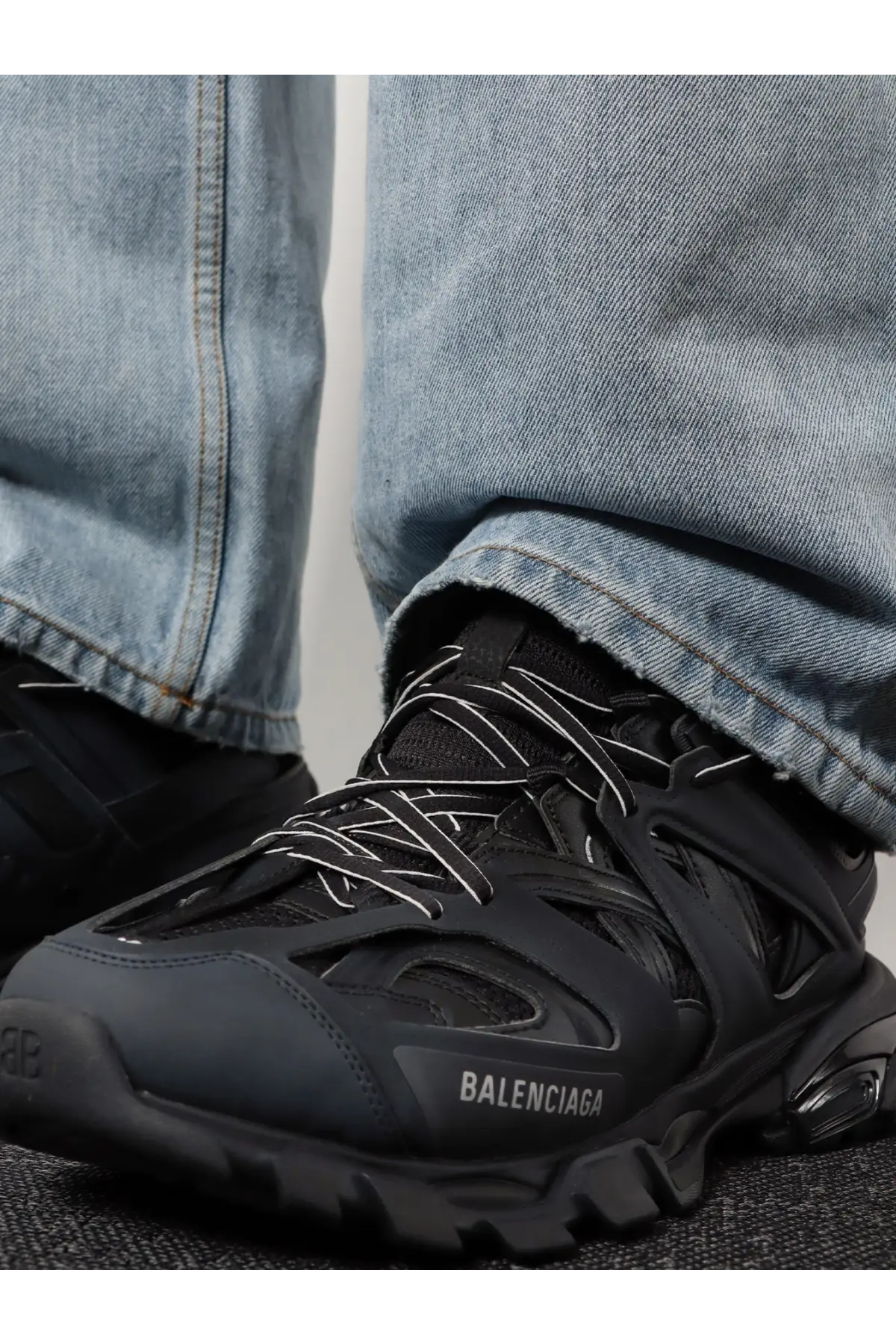 Balenciaga men’s track nylon and mesh sneakers in black with white laces and chunky rubber sole