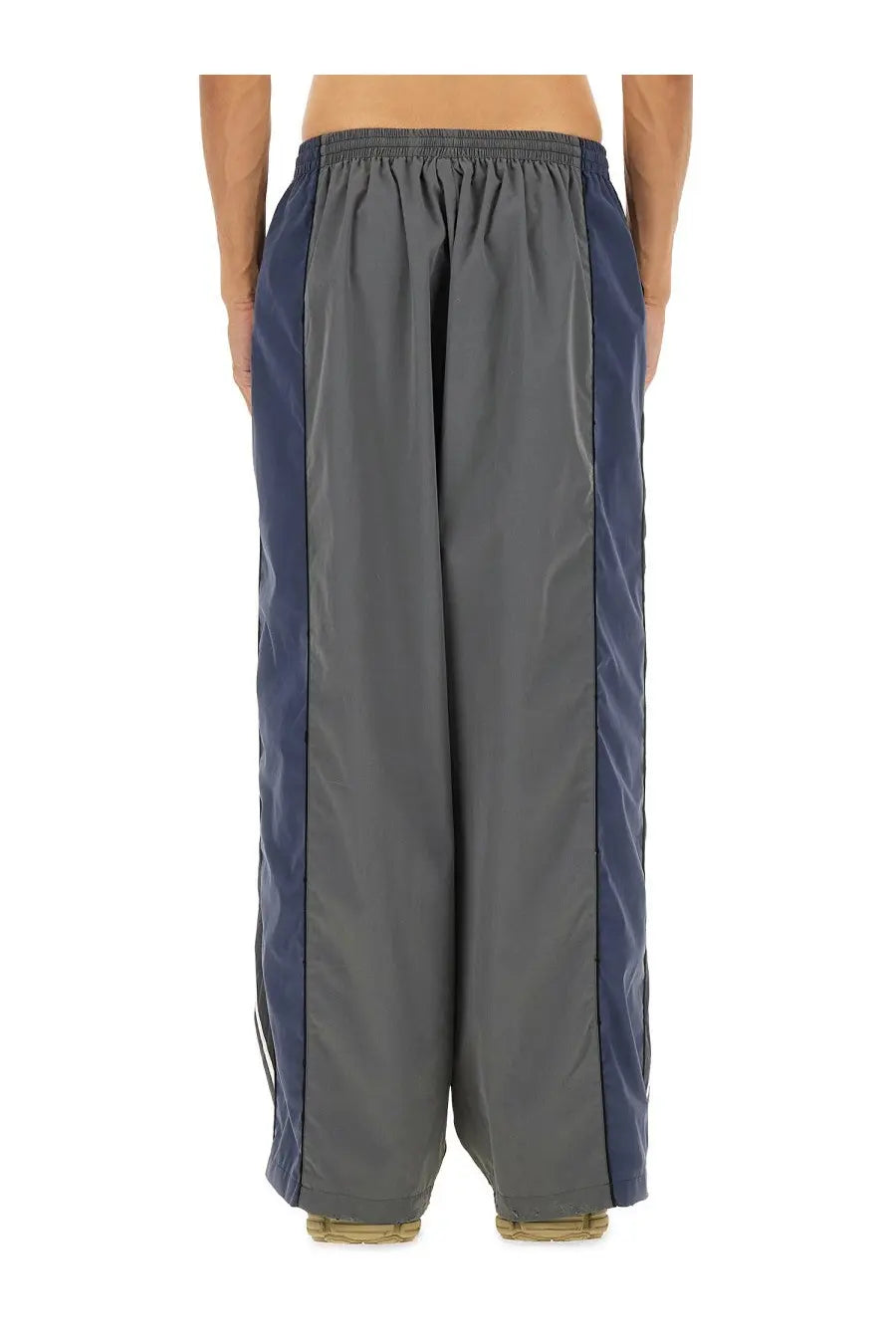 Balenciaga men’s black tracksuit pants in gray and navy blue with a relaxed wide-leg cut for casual wear