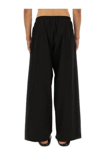 Balenciaga men’s black wide-leg tracksuit pants with elastic waistband in a comfortable casual fit