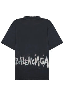 Balenciaga unisex medium fit black t-shirt showing back with white spray painted logo across lower back