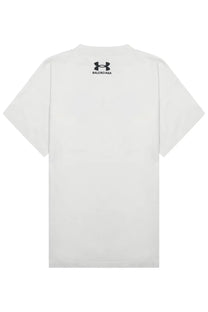 White short-sleeved Balenciaga unisex t-shirt with black under armour logo and Balenciaga text at the neckline