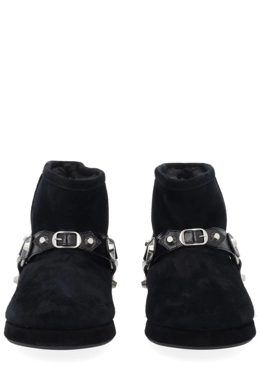 Balenciaga women’s black suede ankle boots with silver buckle straps and metallic accents in alaska style