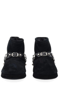 Balenciaga women’s black suede ankle boots with silver buckle straps and metallic accents in alaska style
