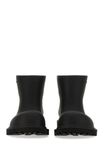 Balenciaga women’s black rubber boots with chunky sole and rounded toe Steroid design