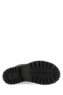 Balenciaga women’s boot steroid black with black rubber sole embossed logo and textured tread pattern