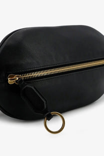 Balenciaga women’s black leather fanny pack with gold zipper and matching metal ring for stylish hands-free use