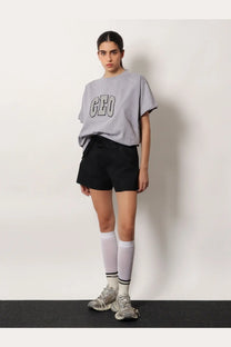 Balenciaga women’s grey boxy fit cotton t shirt with geo printed in bold black and white lettering across the chest