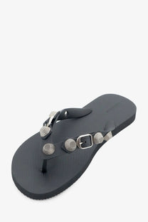 Balenciaga women’s cagole black flip-flops with silver metallic studs and buckle detail on the strap