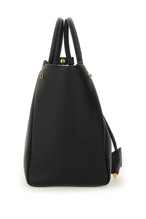 Balenciaga women’s black leather tote bag with gold-tone hardware and dual top handles for carry all use