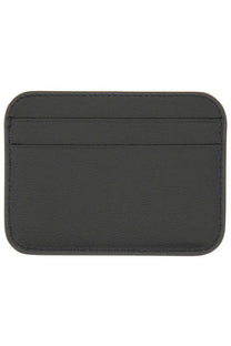 Balenciaga women’s cash card holder in black leather with rounded corners and stitched edges visible from front