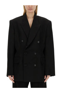 Balenciaga women’s black double-breasted blazer with structured shoulders and matte black buttons