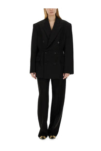 Balenciaga women’s black double-breasted cinched jacket with structured shoulders and matte finish fabric