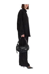 Black leather balenciaga city bag with metallic hardware and structured asymmetrical design for women