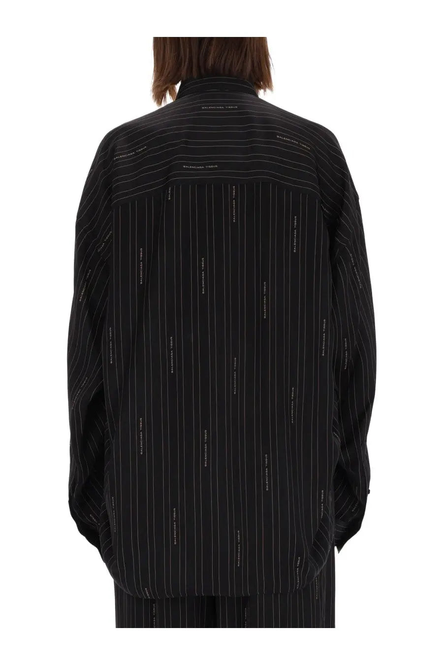 Balenciaga women’s cocoon shirt black showing the back with white balenciaga text logo pattern on black pinstripe fabric