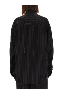 Balenciaga women’s cocoon shirt black showing the back with white balenciaga text logo pattern on black pinstripe fabric