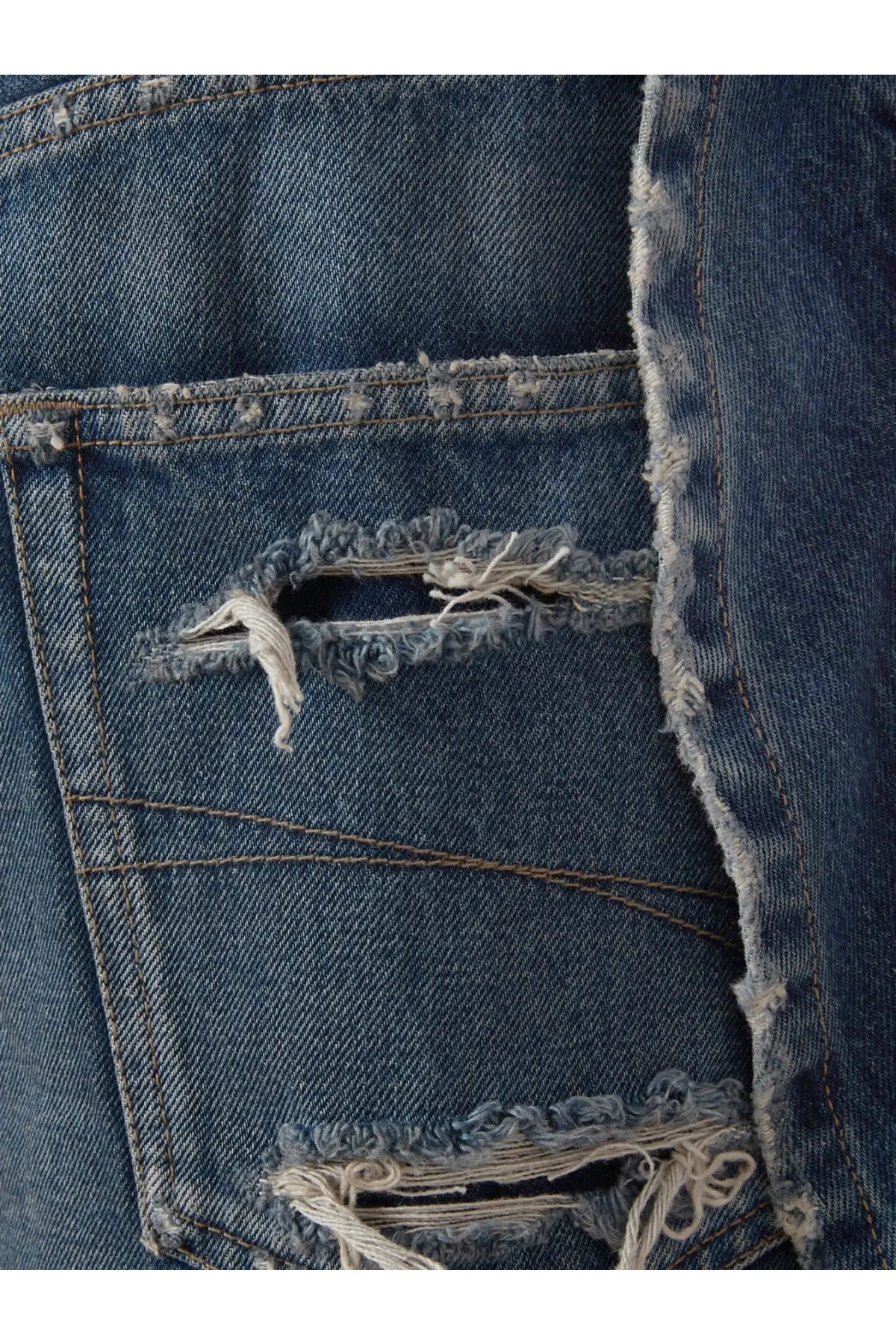 Balenciaga women’s blue cotton bermuda shorts with distressed frayed ripped details and visible stitching