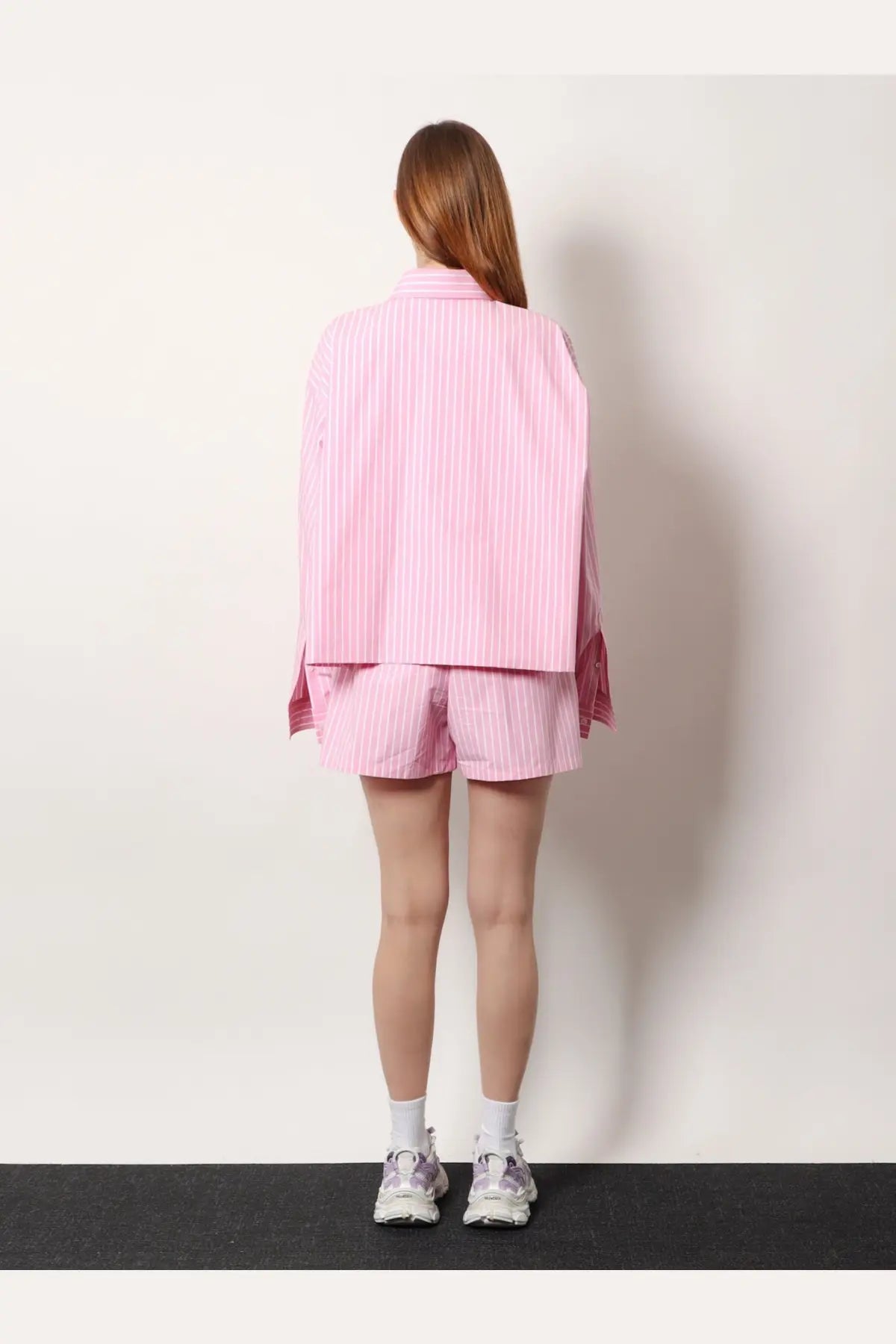 Balenciaga women’s blue cotton boxer shorts with pink striped button-up shirt made of lightweight cotton fabric