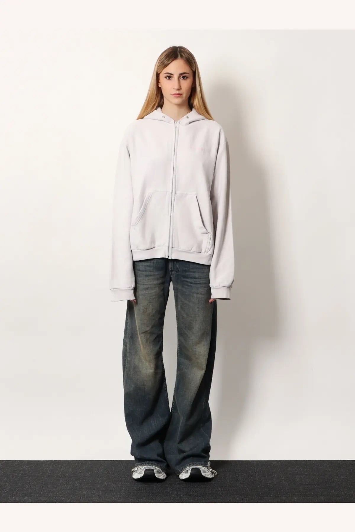 Balenciaga women’s cotton zip-up hoodie in soft light gray with relaxed fit and front pockets
