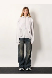 Balenciaga women’s cotton zip-up hoodie in soft light gray with relaxed fit and front pockets