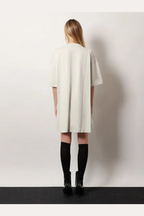 Balenciaga women’s off-white cotton jersey oversized t-shirt dress with short sleeves and a relaxed silhouette