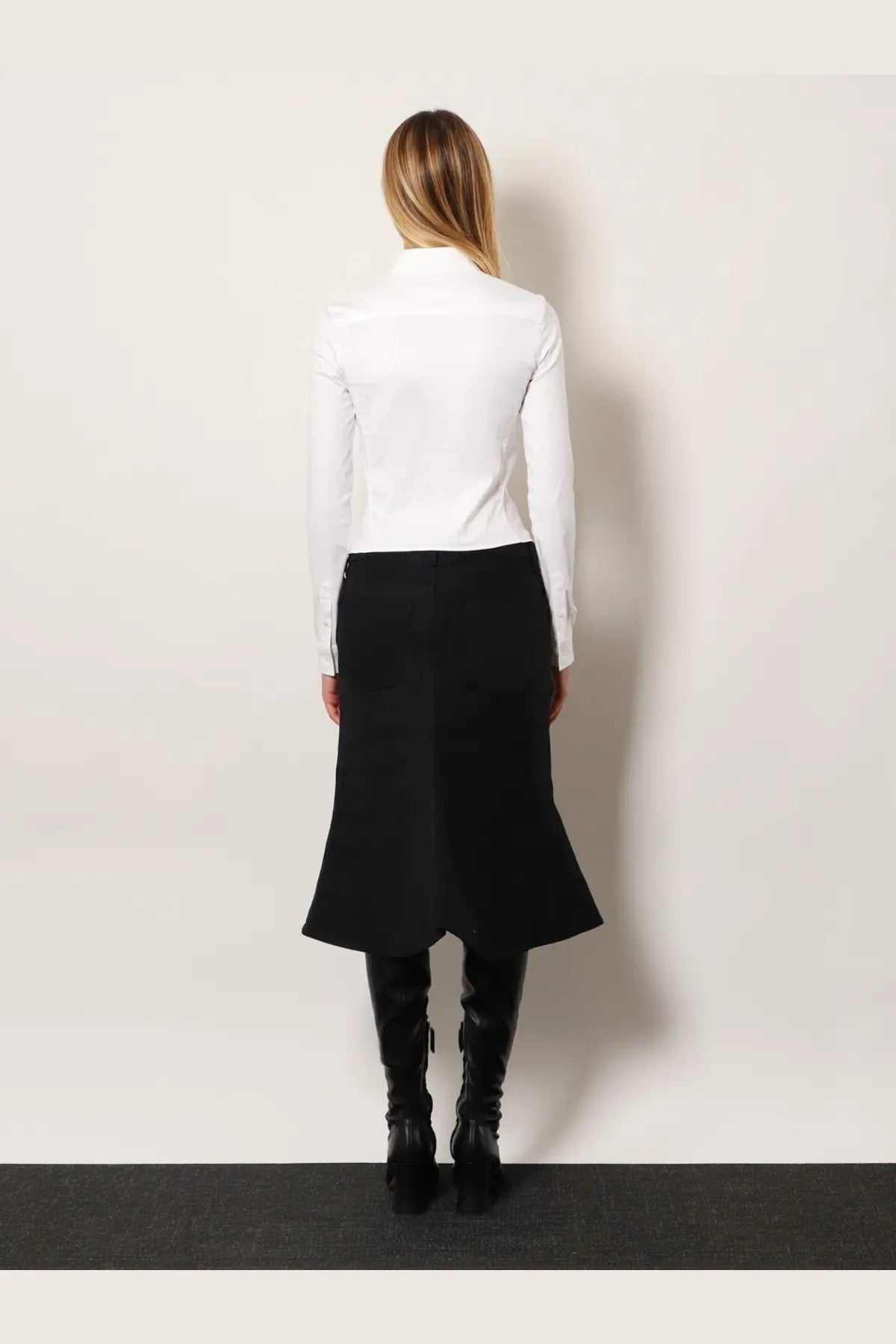 Balenciaga women’s black cotton midi skirt with high-waisted, flared silhouette and subtle side seam detailing