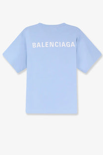 Light blue balenciaga women’s cotton t shirt with white lettering across the back