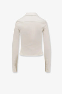 Cream-colored balenciaga women’s cotton shirt with long sleeves, classic collar, button-up front, and tailored fit